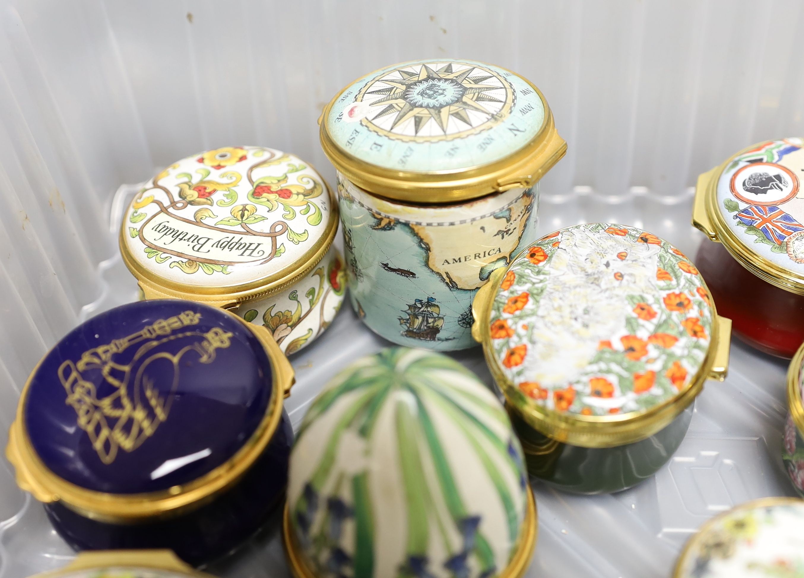 A collection of thirteen enamel boxes, mostly Halcyon Days.